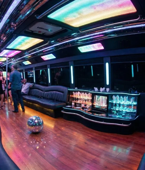 Hamilton party bus interior with dance floor, LED lights, and premium sound system.